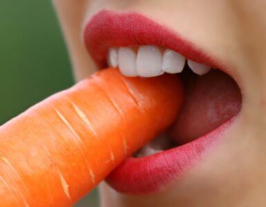 girl eating carrot